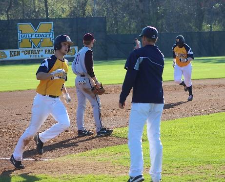James Land (right) & Richie Clark round the bases after Land's 2 run HR vs. Hinds Mar. 18.