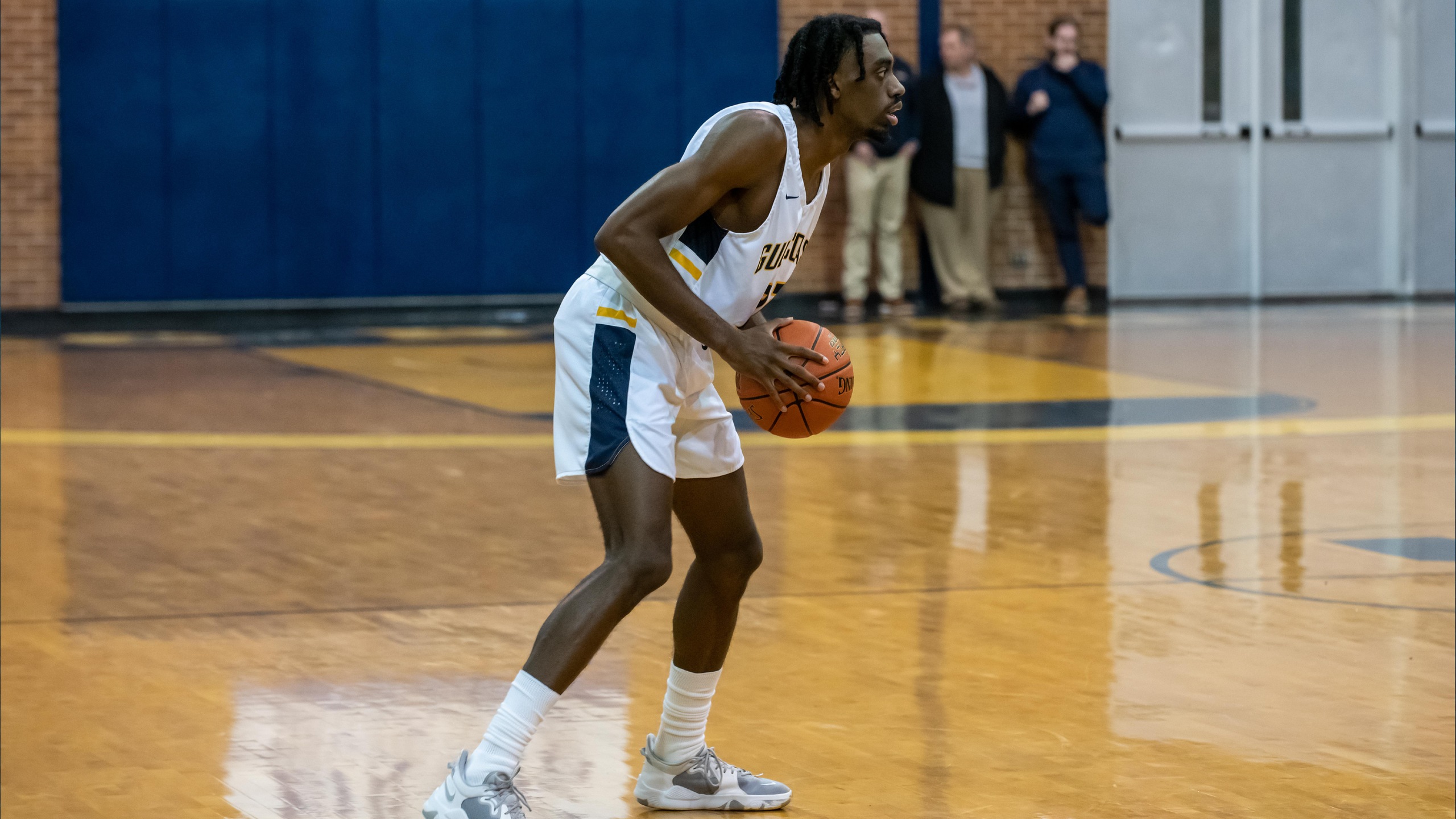 Gulf Coast men leap into 5th