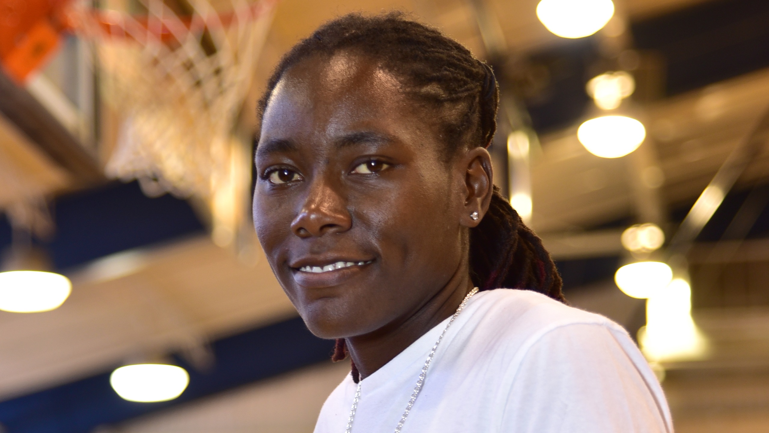 REESE LEAPS TO THIRD MEDAL